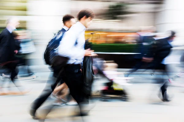 Walking commuters at rush hour — Stock Photo, Image