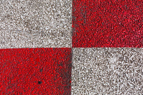 Asphalt with red and white paint — Stock Photo, Image