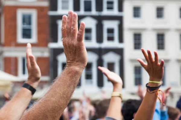 Raising hands — Stock Photo, Image