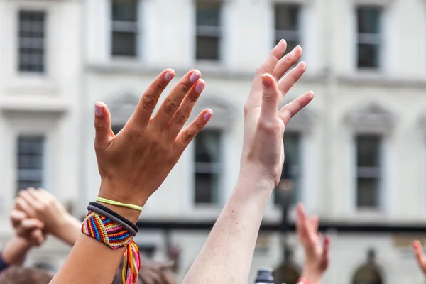 Raising hands — Stock Photo, Image