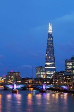 Skyscraper The Shard in London, UK, at night clipart