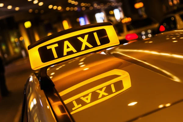 Lighted taxi sign on a roof of a German taxi — Stock Photo, Image