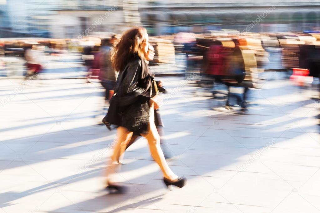 People in the city in creative motion blur