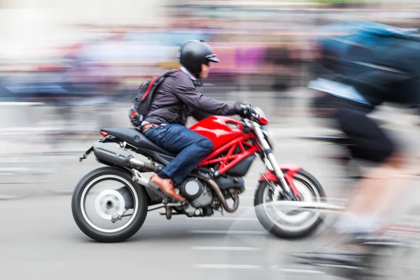 Motorcyle op de weg in motion blur — Stockfoto