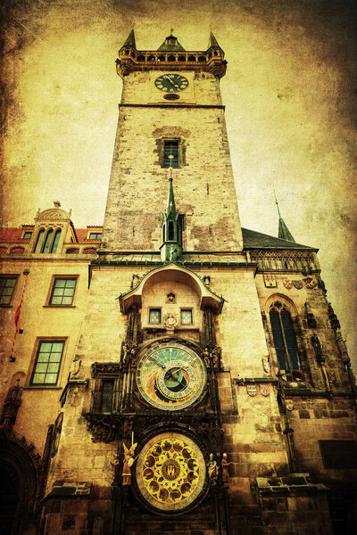 Vintage style picture of the Old Town City Hall Tower with a famous astronomical clock in Prague, Czechia