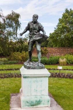 Theroyal Botanik Bahçesi Kew, İngiltere'de kanalizasyonda heykeli