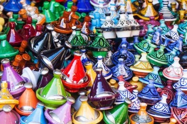 Colorful ceramic vessels in the souks of Marrakech, Morocco clipart