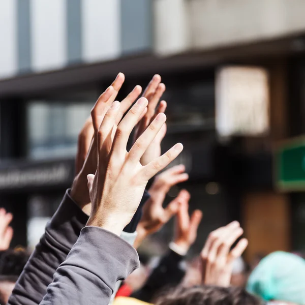 Raised hands — Stock Photo, Image