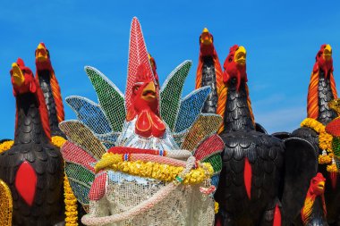 Sculptures of artistic cocks in Ayutthaya, Thailand clipart