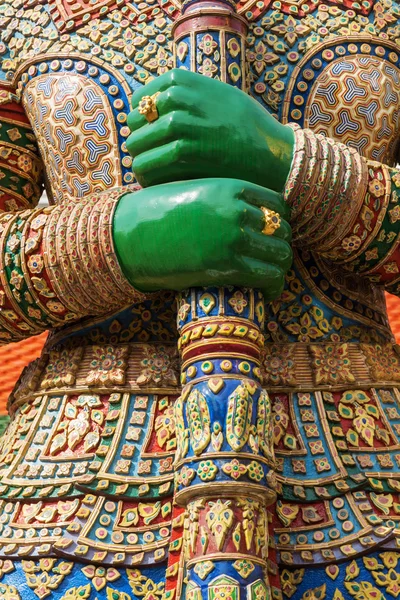 Detail of a traditional demon guardian sculpture at a temple in Bangkok, Thailand — Stock Photo, Image