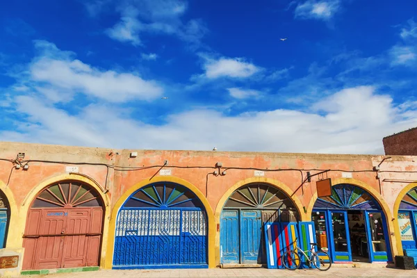 Picturesque doors of artist shops in the old town of Essaouira, Morocco, which is completely under the protection of the UNESCO world heritage