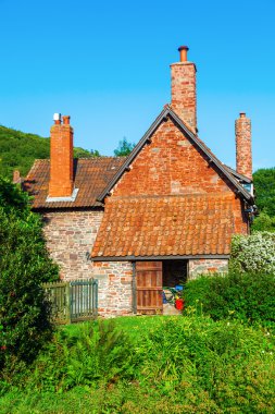 old cottage in Allerford, England clipart