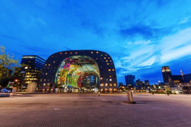 modern market hall in Rotterdam, Netherlands, at night
