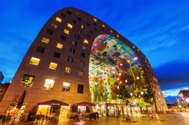 modern market hall in Rotterdam, Netherlands, at night