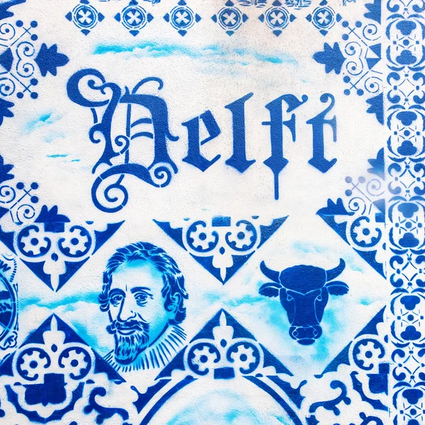 Cerámica Delft pintado visto en una pared en el casco antiguo de Delft, Países Bajos — Foto de Stock