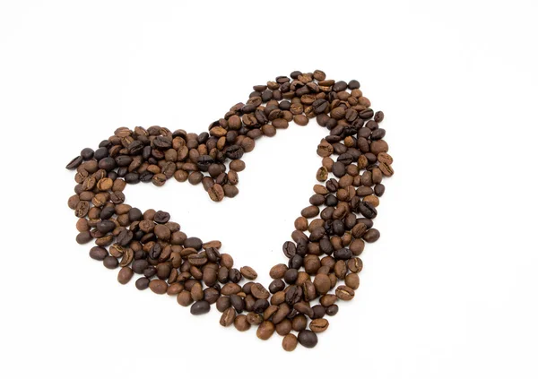 Coffee heart seed on white — Stock Photo, Image