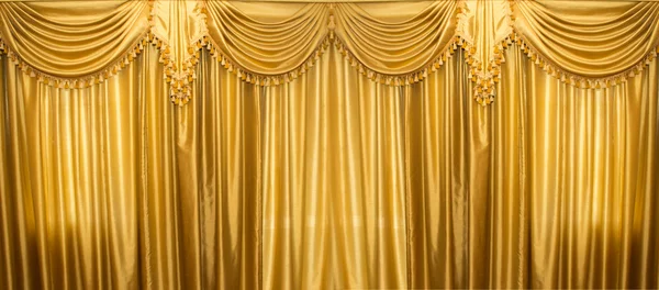 Gold curtains on stage — Stock Photo, Image