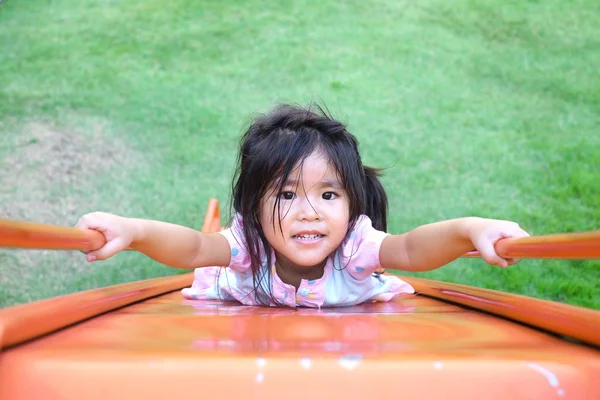 Thai girl play slider — Stock Photo, Image