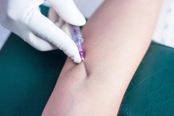 pin in arm for blood test