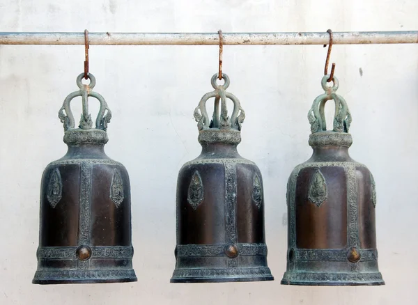 Buddha brass bell hanging  on iron tube — Stock Photo, Image