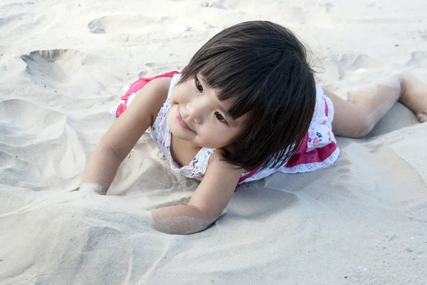 Close up happy face asian children on sand — Stock Photo, Image