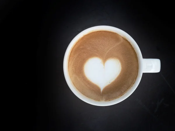 Cup of latte art coffee — Stock Photo, Image