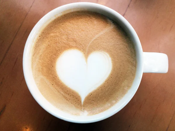 Cup of latte art coffee — Stock Photo, Image