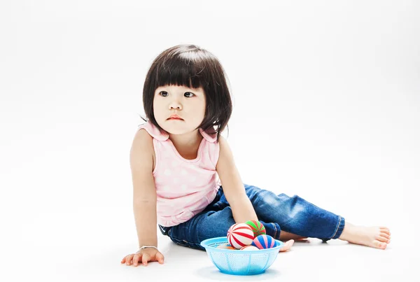 Asian girl play colour ball — Stock Photo, Image