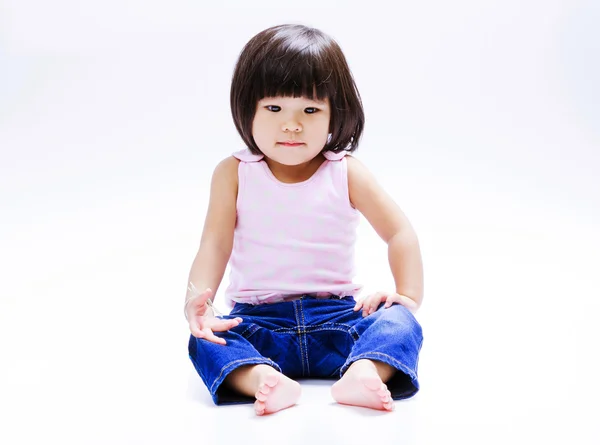 Asian girl sitting isolate — Stock Photo, Image