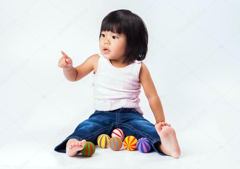 asian girl play colour ball