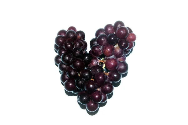 Red grape in heart shape — Stock Photo, Image