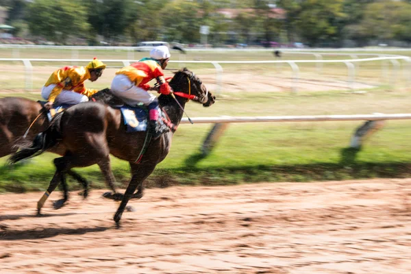 Moving jocky and horse racing sport — Stock Photo, Image