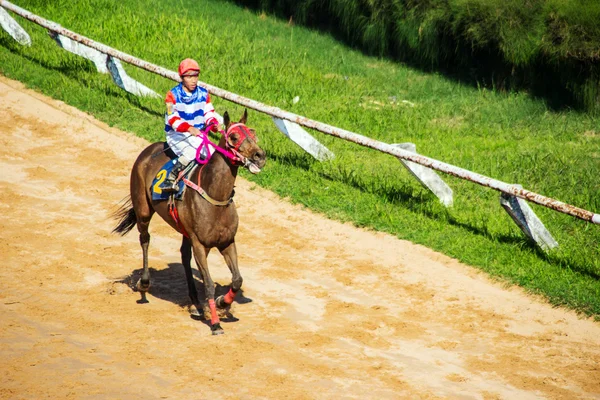 Moving jocky and horse racing sport — Stock Photo, Image