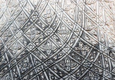 Tay desen stili çimento üzerinde