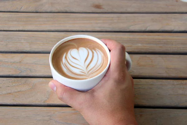 Main tenir tasse de café — Photo