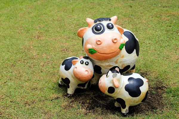 smile cow statue with cement decoration outdoor