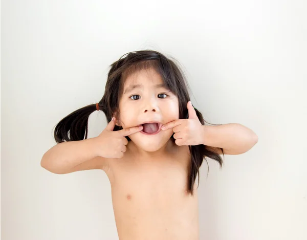 Bonito menina engraçado rosto — Fotografia de Stock