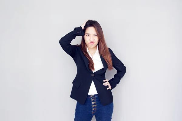 Asiático chica acción con suite y jeans —  Fotos de Stock