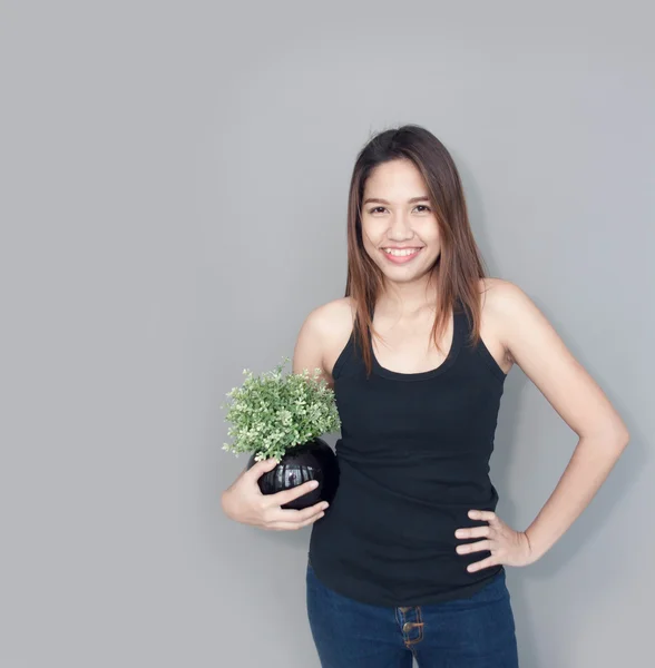 Tailandês senhora segurar planta — Fotografia de Stock