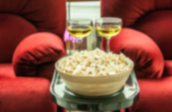 popcorn and drink on cinema seat