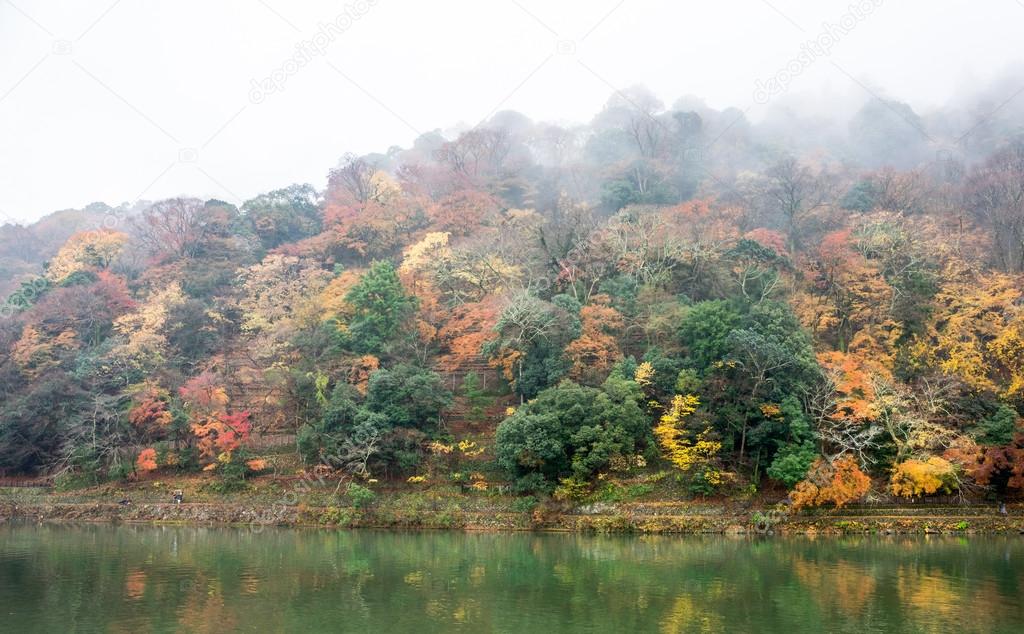 Hills and lake in Arashiyama, Japan.