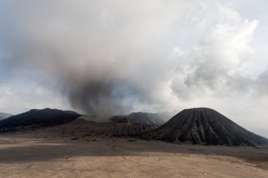 Mount Bromo erupts clipart