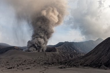 Mount Bromo erupts clipart