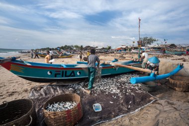 Fishermen at work in Jimbaran, Bali Island.