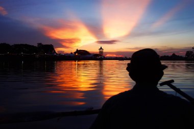 Sarawak River boatman clipart