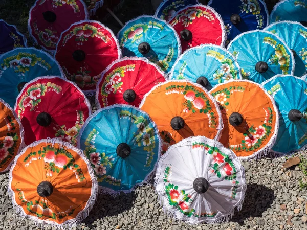 Painted parasols dry in the sun — Stock Photo, Image