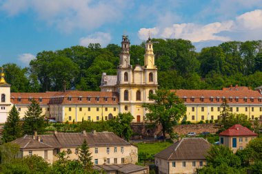 View on ancient monastery of the Exaltation of the Holy Cross is  Basilian monastery in Buchach city, Ternopil region, Ukraine. Tourist landmark clipart