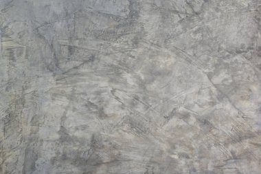 Beton duvar binanın duvarını gösteriyor ve sıvı solüsyonla boyanmış..