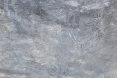 Beton duvar binanın duvarını gösteriyor ve sıvı solüsyonla boyanmış..