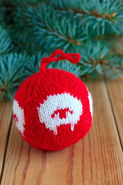 Knitted decor for new-year tree with the symbol of the year — Stock Photo, Image